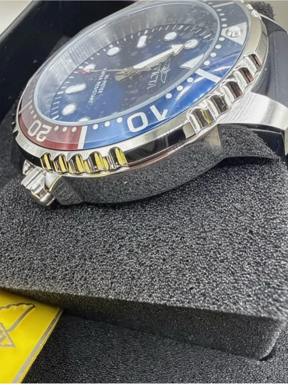 Invicta Men’s Blue Dial Watch with Blue and Red Bezel